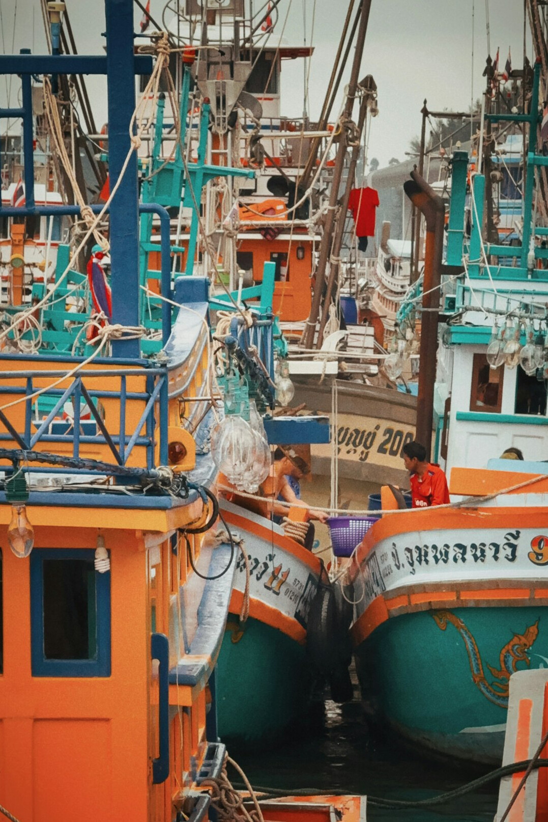 Small fishing harbor with colorful boats