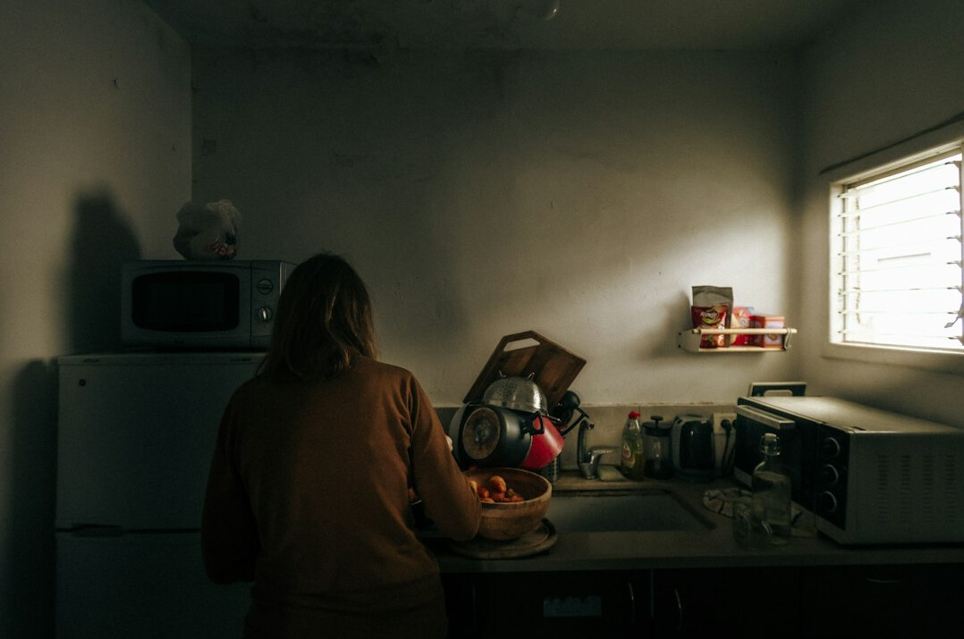 woman cleaning at night